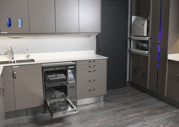 Modern kitchen with sleek dishwasher and spacious sink, designed for efficient meal prep.